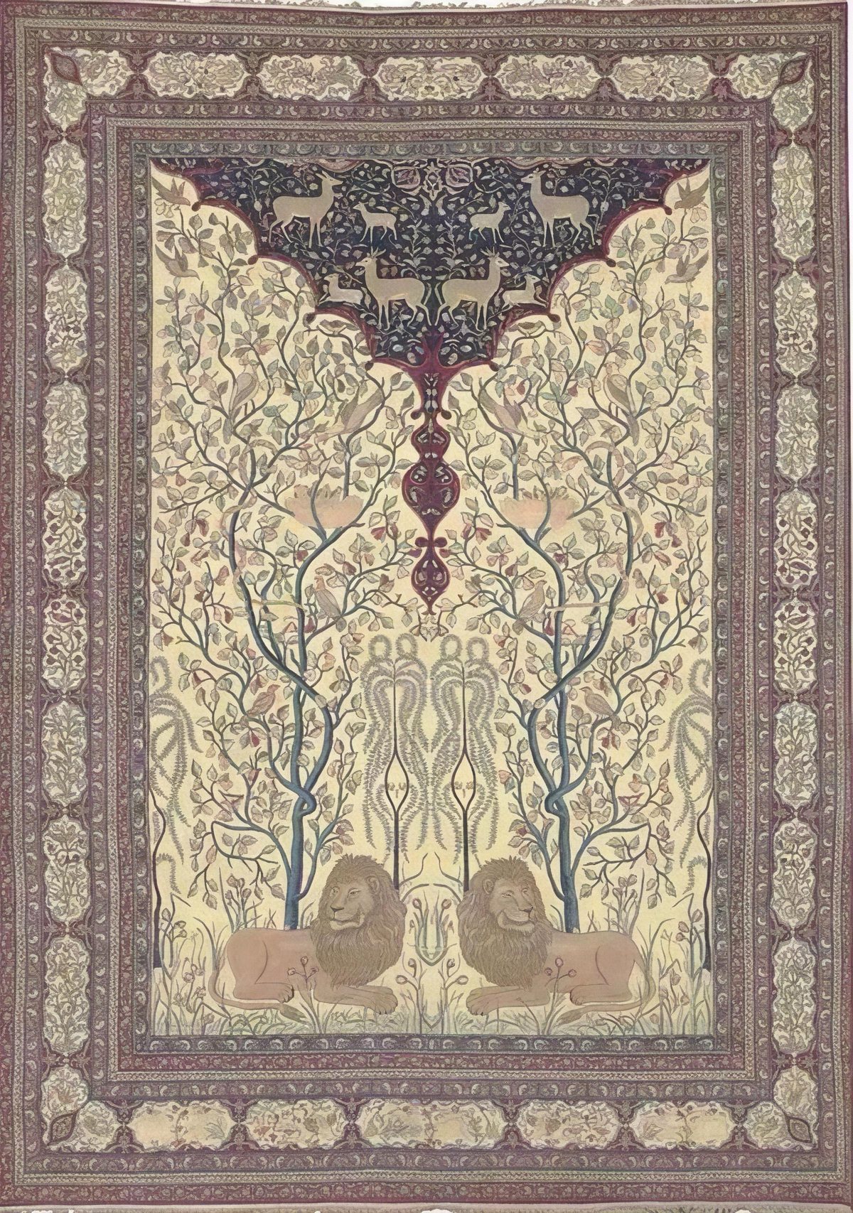 A Lavar Kirman pictorial carpet: an ivory field with two tall flowering trees full of birds and nests, a pair of mirrored lions facing outward at the foot of the field, and stags in the dark arched panel above, framed by a fine floral border