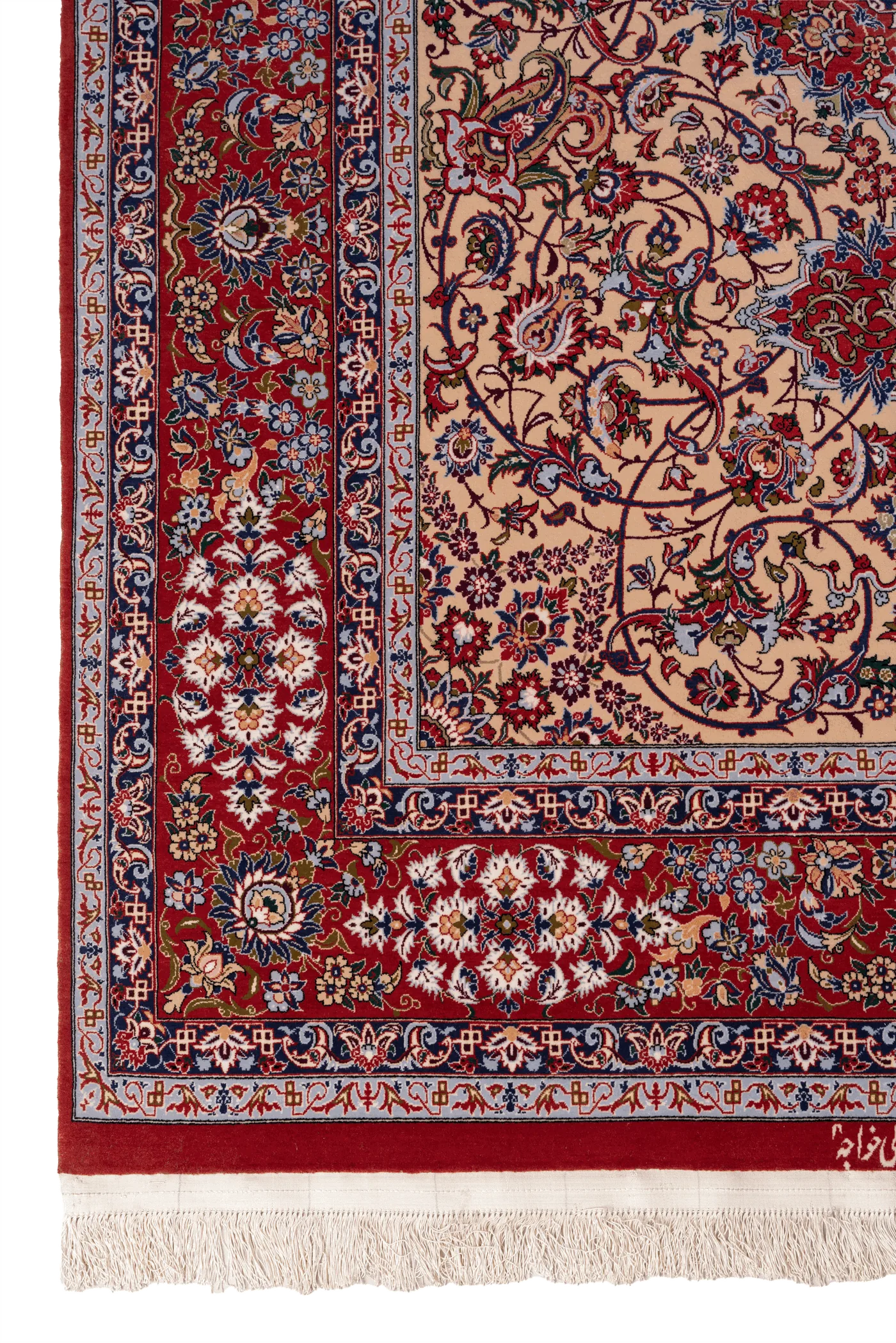 Corner of the Toranj Abbasi showing the layered border system, the ivory main border with palmettes, and the woven Khajeh signature in the lower field above the kelim end and silk fringe.