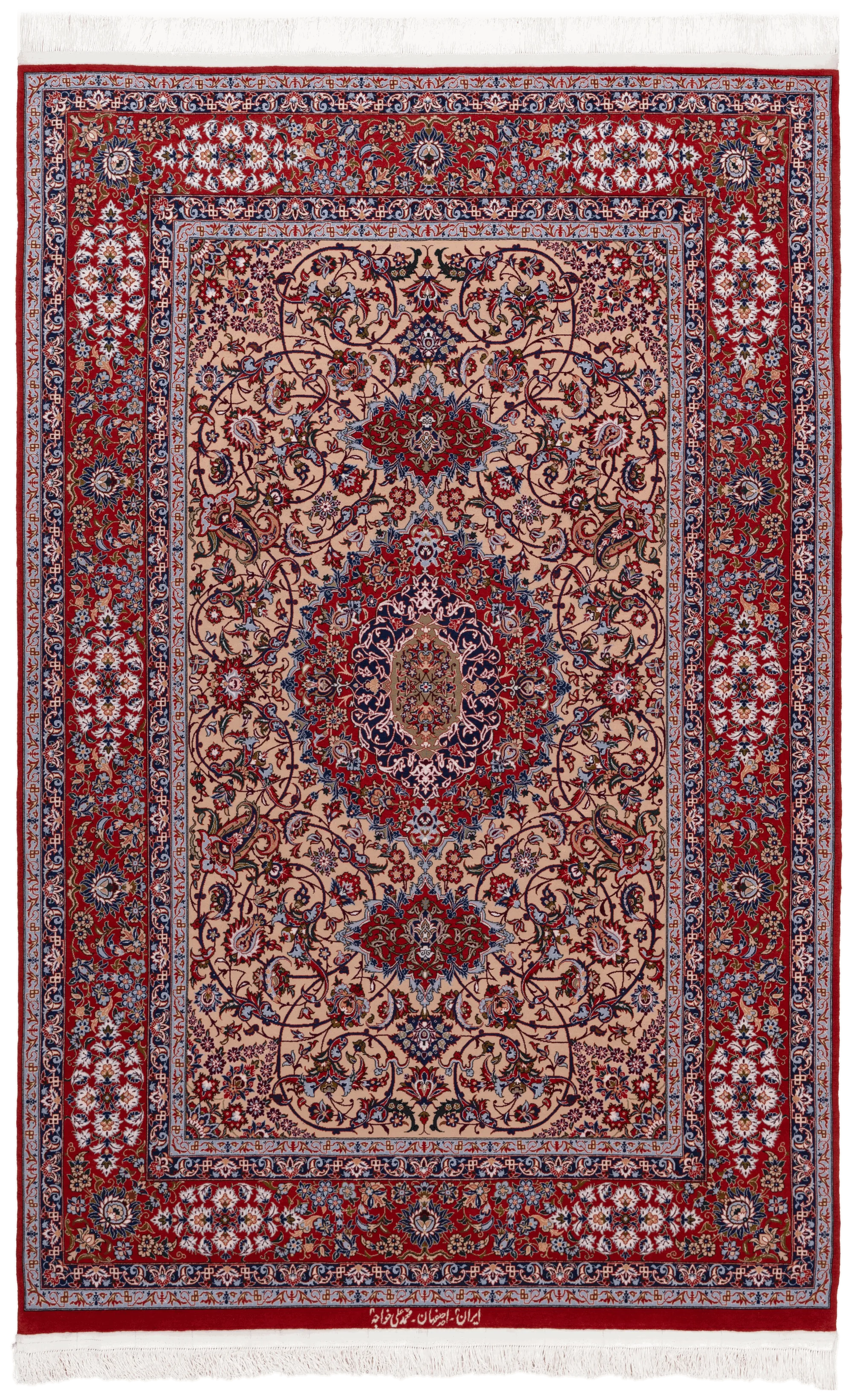 Toranj Abbasi, a signed Mohammad Ali Khajeh carpet of Isfahan, lachak-toranj design with Shah Abbasi medallion and corners on an ivory field.