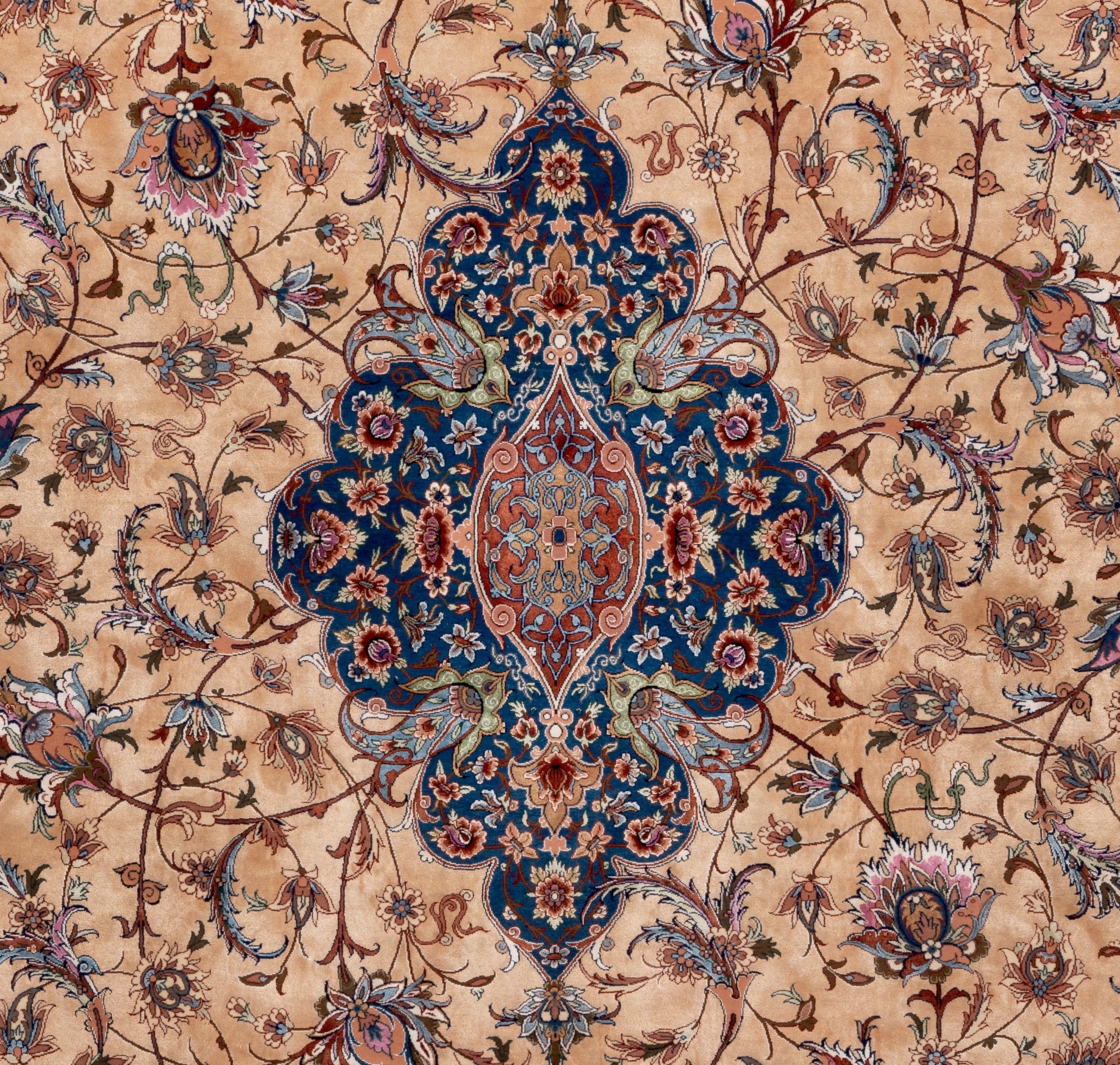 The central medallion of the Gold Field, a navy and salmon toranj of fine floral work set against the gold silk field.