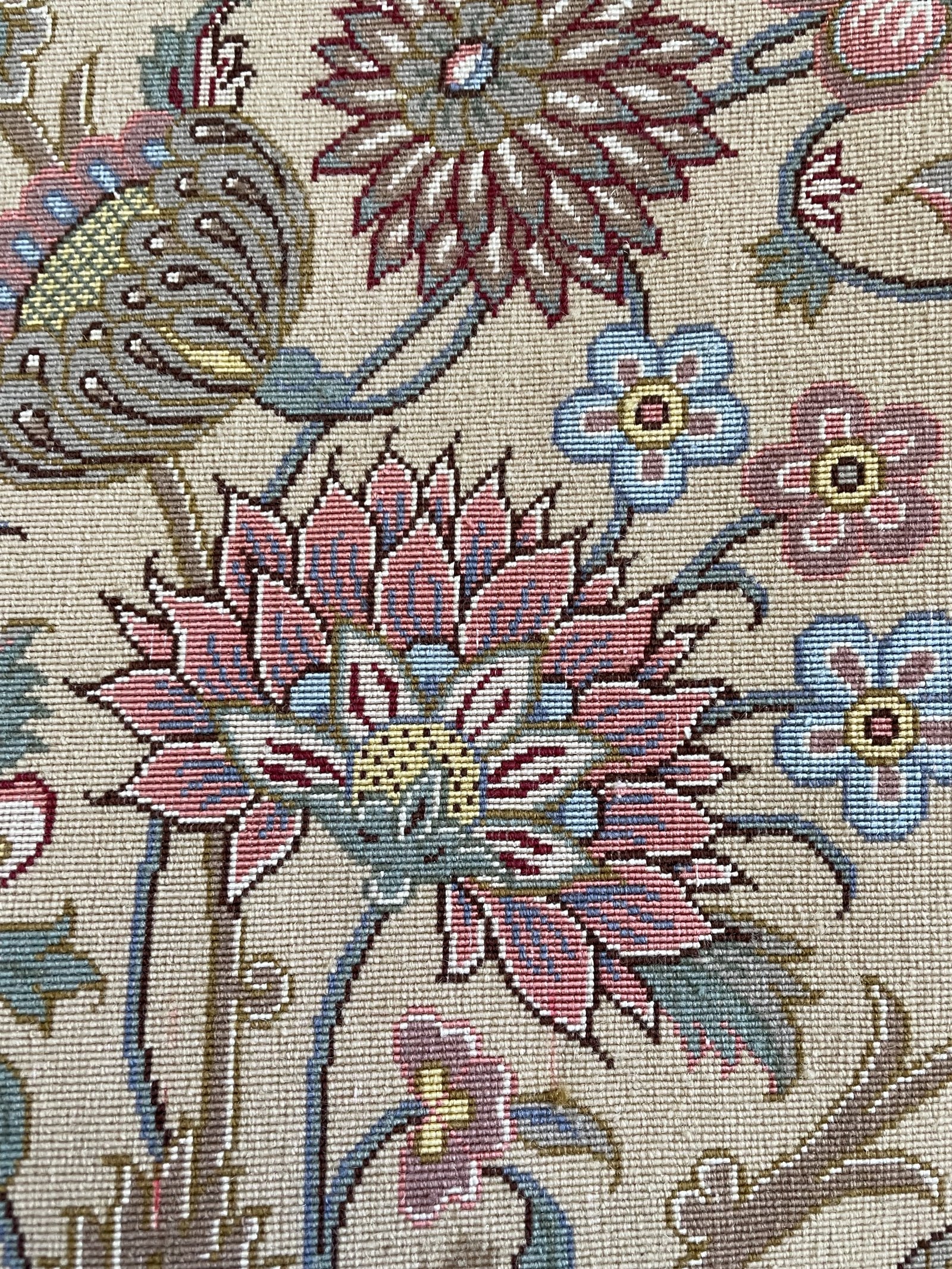 The reverse of the carpet, the design reading crisply through to the back, a record of the fineness and regularity of the knotting.